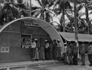 Aore Base Camp ships store with servicemen lined up outside