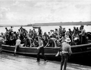 Aore historical photo: Sailors disembarking a boat on a sunny day