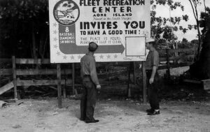 Fleet Recreation Center sign on Aore Island invites visitors to have a good time.