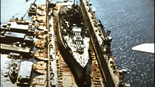 Aerial view of damaged battleship USS Arizona in Pearl Harbor dry dock