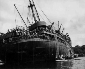 USAT Coolidge survivors disembarking into lifeboats