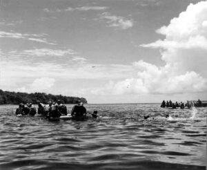 WWII soldiers in boats and water, historical Coolidge context