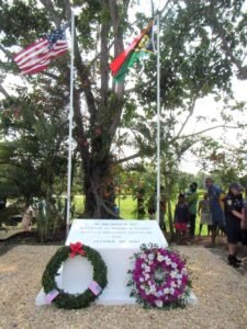Memorial for Captain Elwood J. Euart, with flags and wreaths
