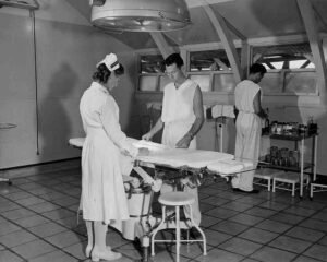 Nurses and doctor in vintage operating room at Hospital #3