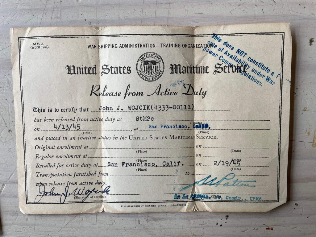 Release from Active Duty document for John J. Wojcik, US Maritime Service, April 13, 1945.