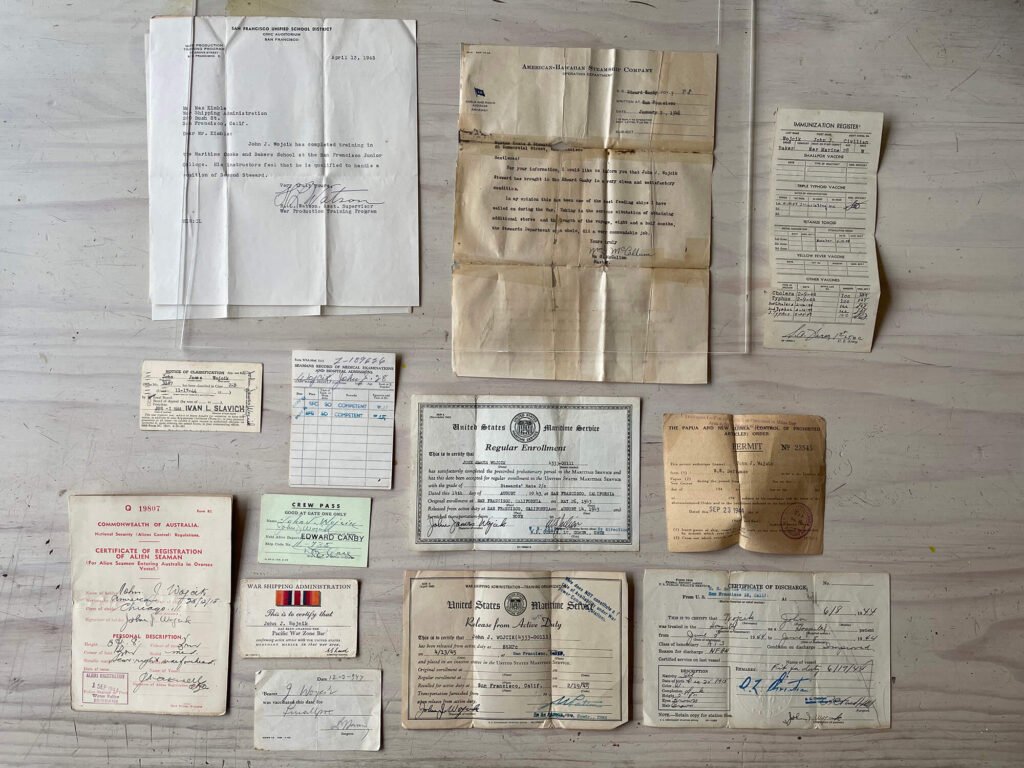 Brad Wojcik donation: WWII documents, immunization, and discharge papers.