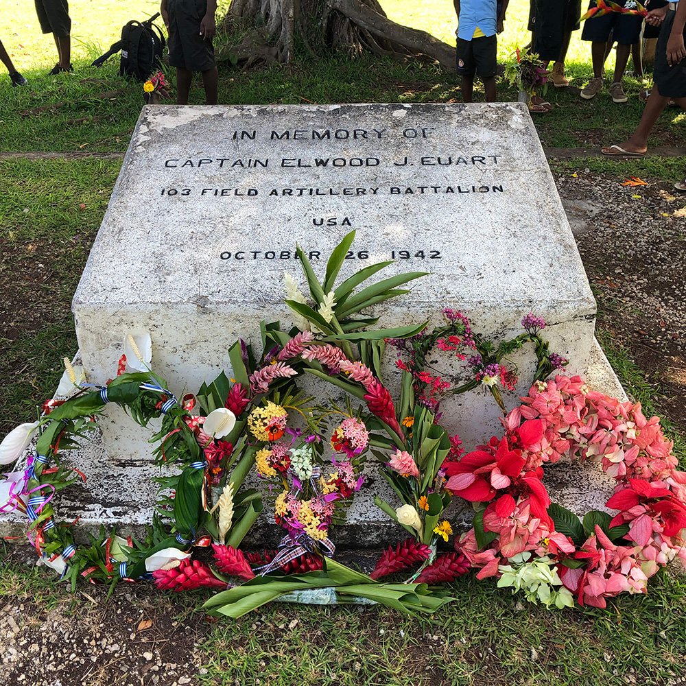 Grave of Captain Elwood J. Euart, 103 Field Artillery Battalion, USA, with floral wreaths.