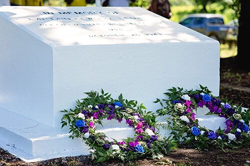 Coolidge Commemoration: White monument with wreaths honoring Captain Alva L. Coolidge, Oct 26, 1942.