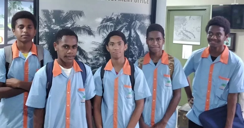 Students show growing interest in schools, posing for a photo.