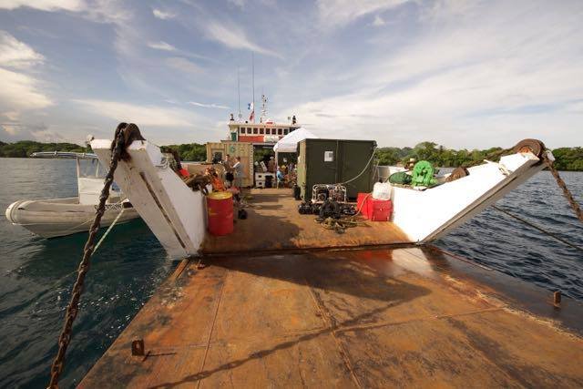 Elwood J Euart landing craft loaded with equipment and a dinghy