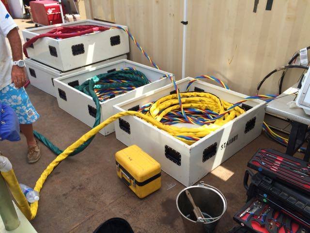Boxes of colorful electrical cables and tools for Elwood J Euart