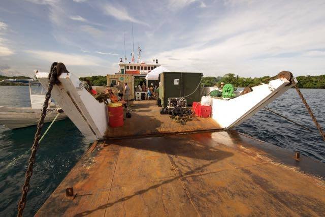 Elwood J Euart barge carrying cargo and equipment on the water.