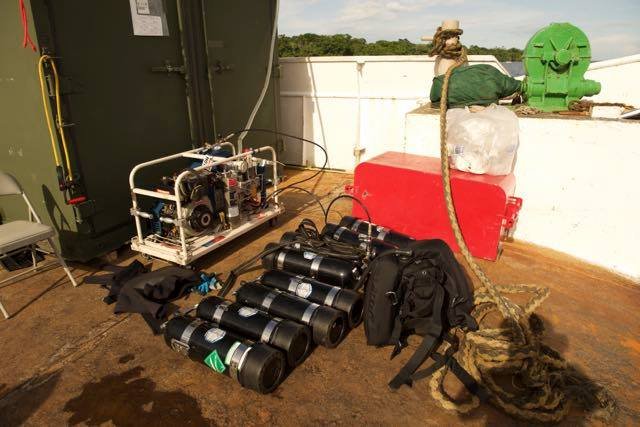 Elwood J Euart: Scuba gear and equipment on a deck.