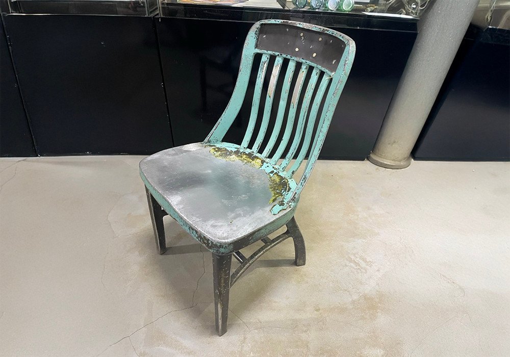Weathered teal and metal chair with distressed finish