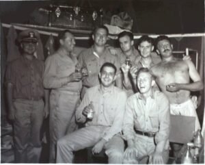 Group of men, possibly from the 25th division, posing for a photo in a tent.