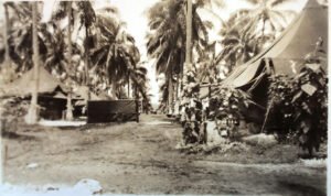 25th Infantry Division camp with tents and palm trees