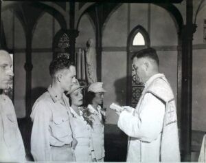 Wedding ceremony in a church with a military couple and priest