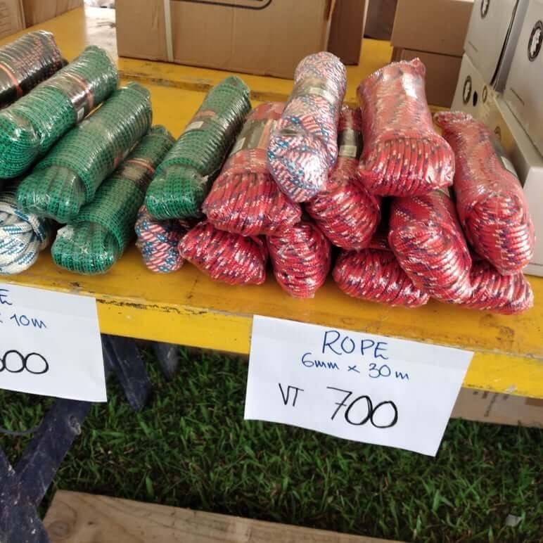 Bundles of green and red rope for sale, with price tags showing "Rope 6mm x 30m VT 700".