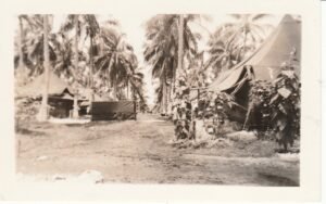 25th Infantry Division camp with tents and palm trees