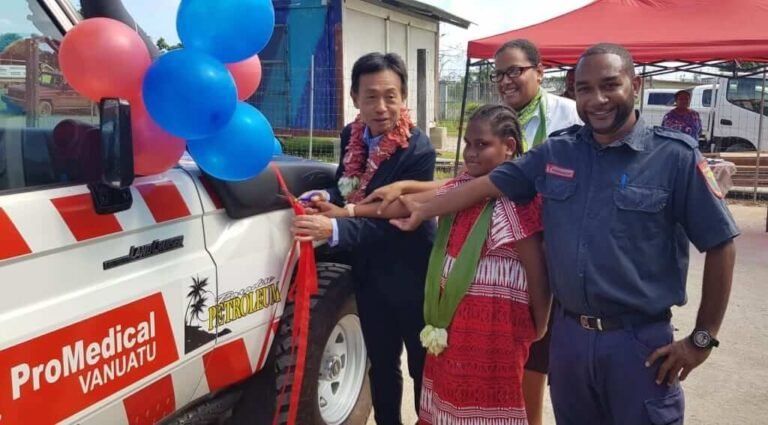 ProMedical Vanuatu vehicle donation ceremony with dignitaries and children