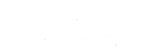 Handwritten signature in white on a green background.